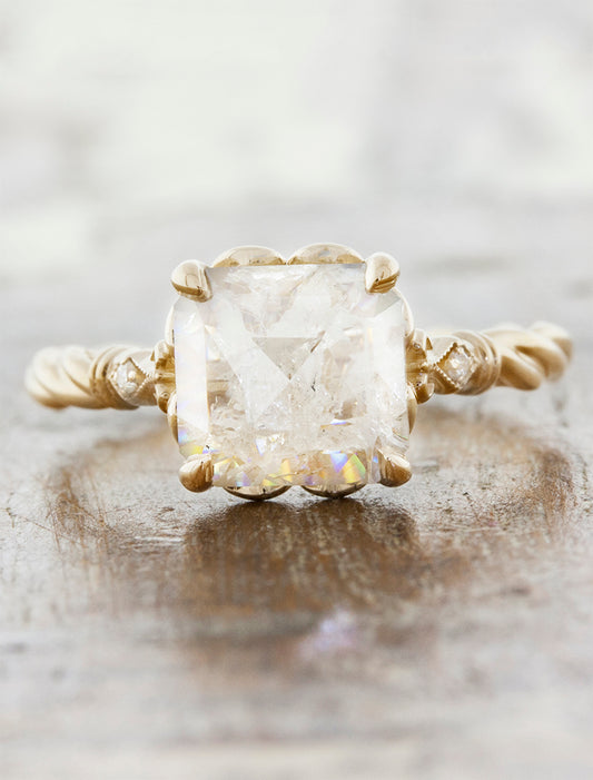caption:Shown with rough diamond in yellow gold