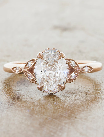 caption:Shown in 14k rose gold, with a 1.22ct oval diamond