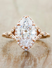 caption:Shown with a 2ct marquise diamond