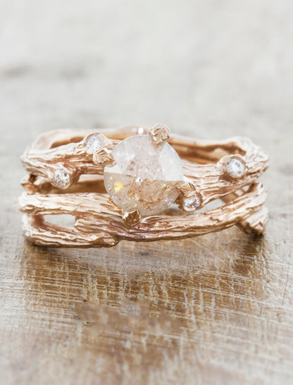 caption:Customized with a rustic diamond, and styled with the Willow wedding band