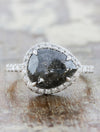 caption:Shown with pear grey diamond in platinum