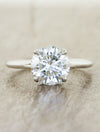 caption:Shown with 1ct round diamond in platinum 