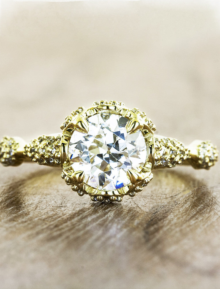 intricate round diamond engagement ring, gold band