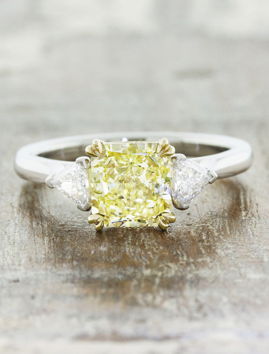 caption:Shown with 1.7ct radiant cut yellow diamond in mixed metal setting