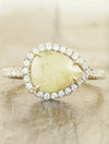 caption:Shown with rustic yellow pear diamond in yellow gold