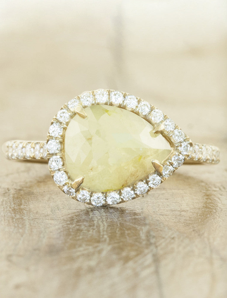 caption:Shown with rustic yellow pear diamond in yellow gold