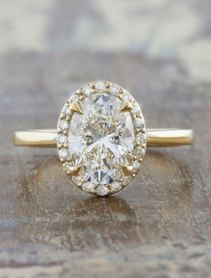 Stunning Oval Halo Diamond Engagement Ring. caption:Shown with 1.7ct center diamond