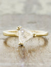 caption:Shown with 0.7ct rough diamond in 14k yellow gold