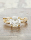 caption:Shown with 1.70ct round diamond in 14k yellow gold, sandblast finish