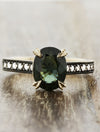 caption:Shown with dark green oval sapphire in 14k yellow gold