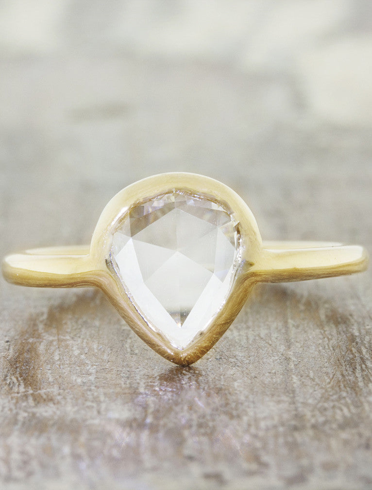 Modern bezel set engagement ring caption:0.80ct. Rose Cut Pear Diamond 14k Yellow Gold