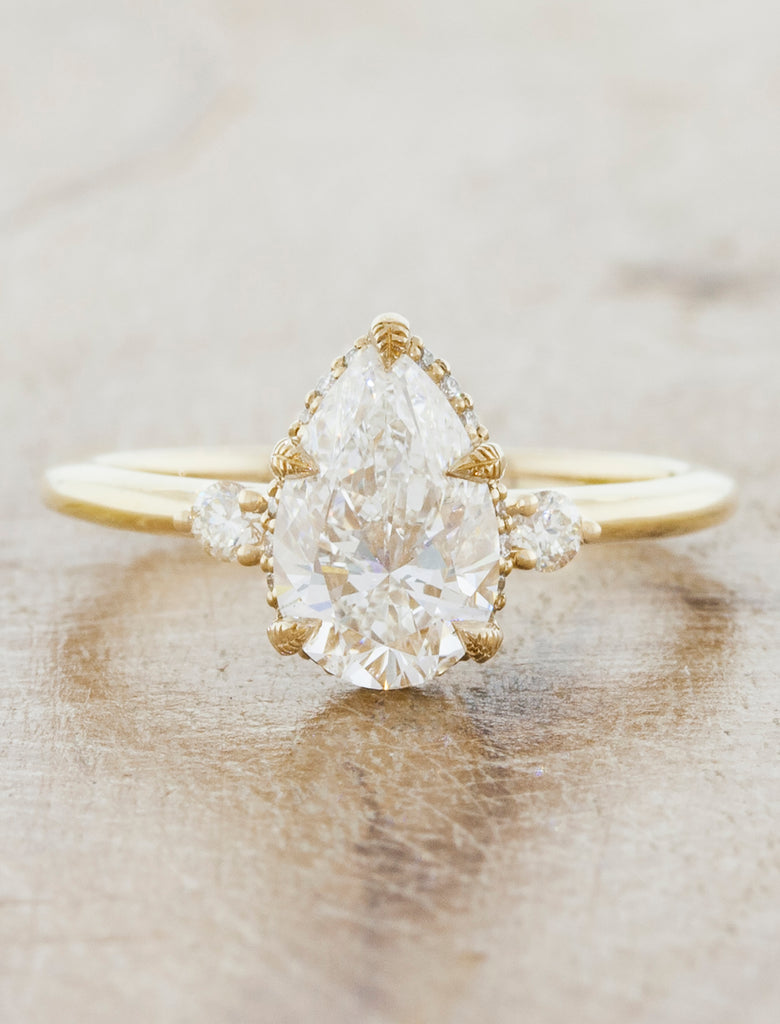 Unique nature inspired engagement ring;caption:1.25ct. Pear Diamond 14k Yellow Gold