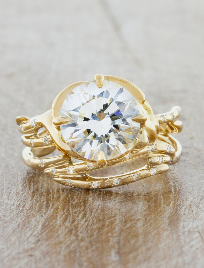 Unique nature inspired engagement ring;caption:1.75ct. Round Diamond 14k Yellow Gold paired with Selene wedding band