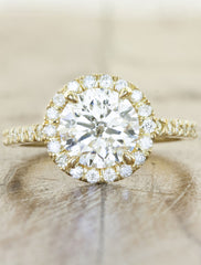 Round diamond halo engagement ring. caption:Shown with an 1.5ct diamond, set in 14k yellow gold