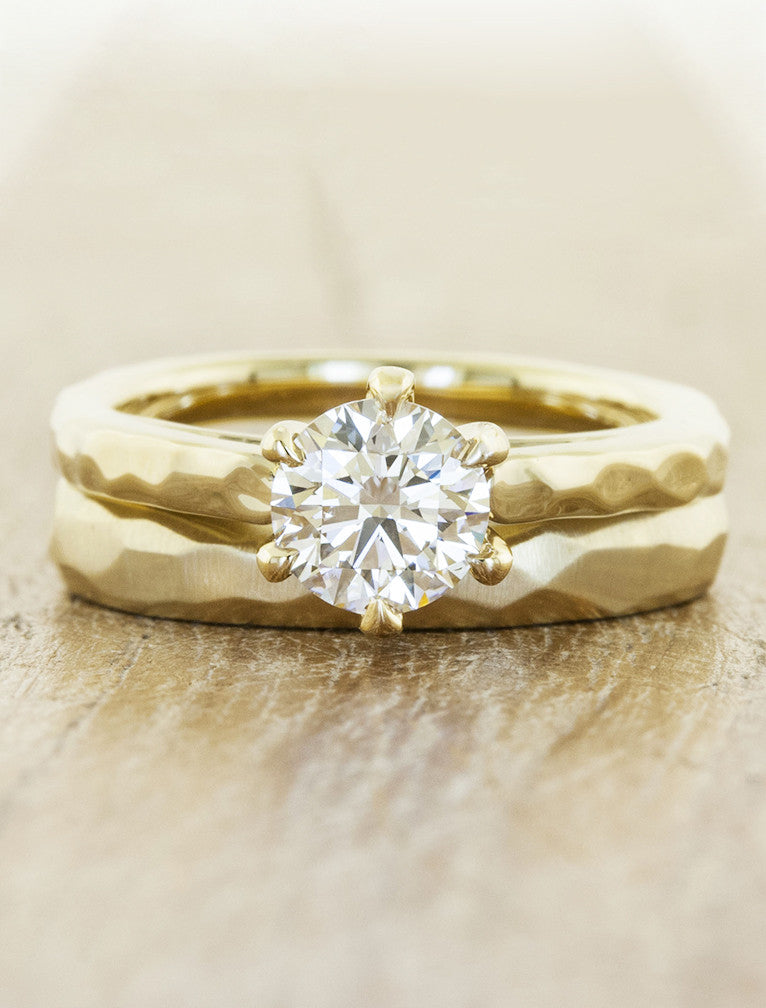 Unique engagement ring with textured band;caption:1.20ct. Round Diamond 14k Yellow Gold paired with Grove wedding band