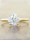 caption:Shown with 1.2ct round diamond in 14K yellow gold