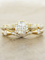 wavy, varying thickness diamond wedding band set - yellow gold, paired with floral engagement ring