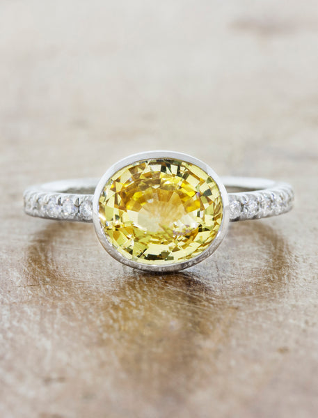 yellow oval sapphire in 2mm pave band