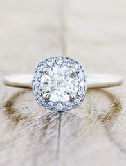halo diamond engagement ring, plain band. caption:Shown with 0.9ct diamond option in platinum