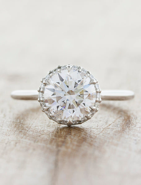 Subtle halo engagement ring;caption:2.00ct. Round Diamond Platinum