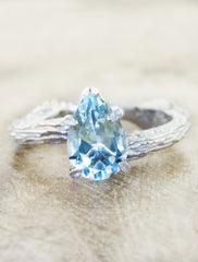 Nature inspired solitaire engagement ring caption:1.30ct. Pear Aquamarine Platinum