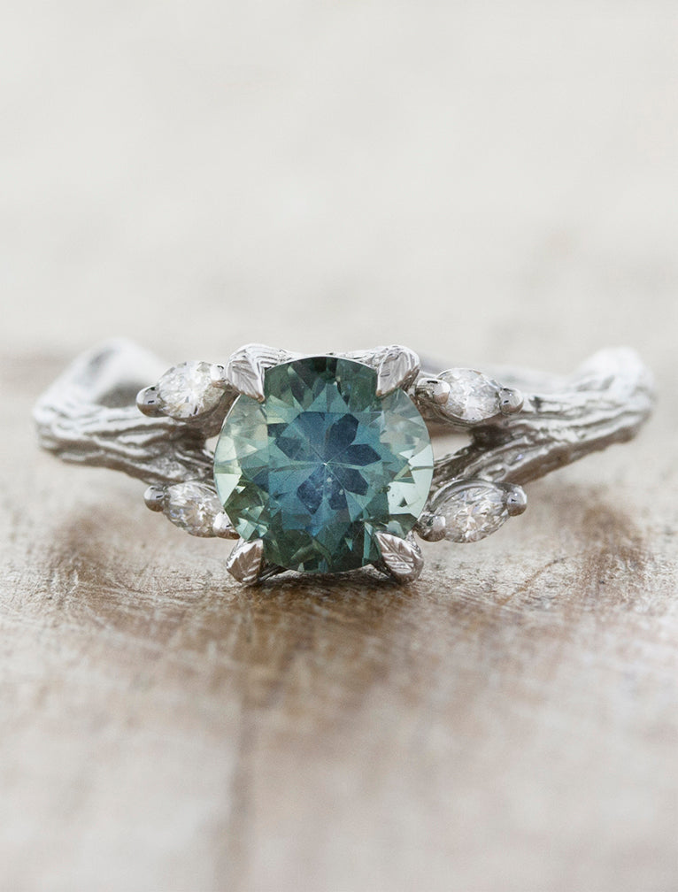 caption:Shown with round Montana sapphire in platinum