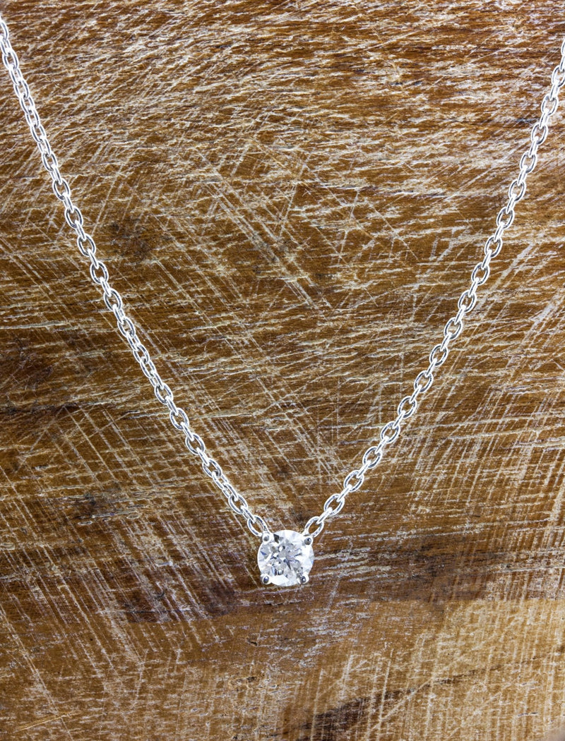 caption:Shown with a 0.70ct diamond in platinum