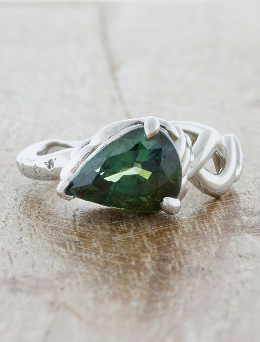 caption:Shown with 3.52ct pear sapphire in platinum 