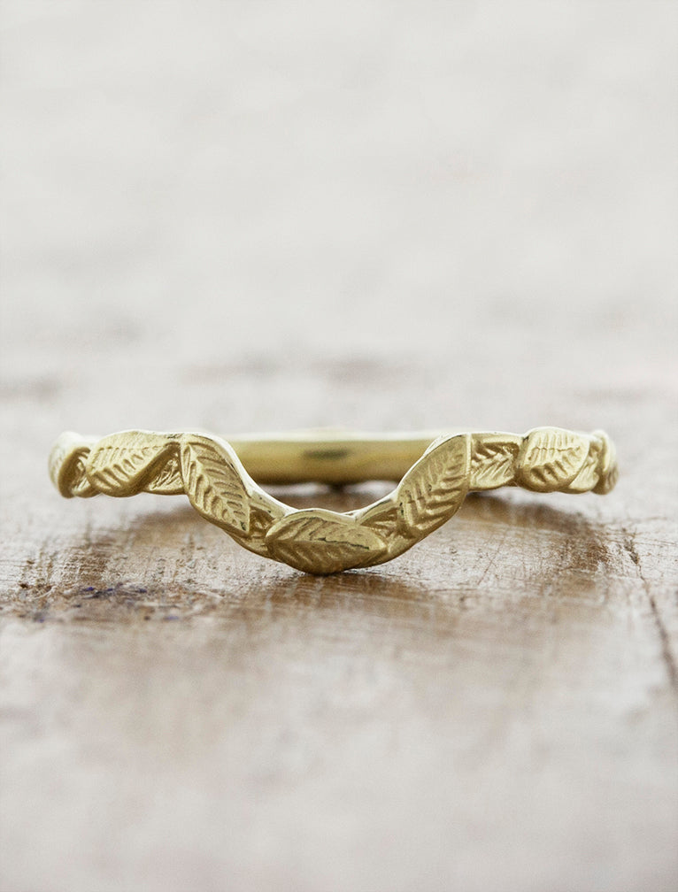 caption:Customized curved in 14k yellow gold, polished finish