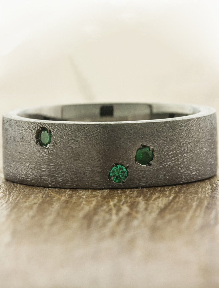 unique men's dark metal wedding ring, gemstone accents