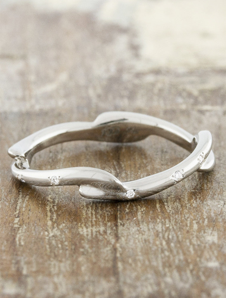 caption:Customized with diamonds in platinum