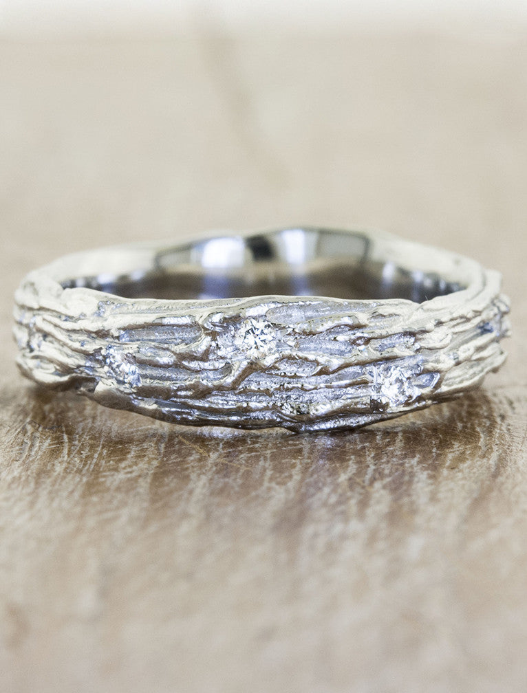 caption:Customized with diamonds in platinum