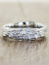 caption:Shown in 6mm width, platinum. Customized with diamond settings