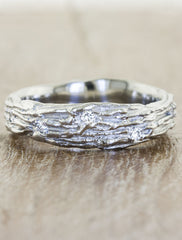 caption:Shown in 6mm width, platinum. Customized with diamond settings