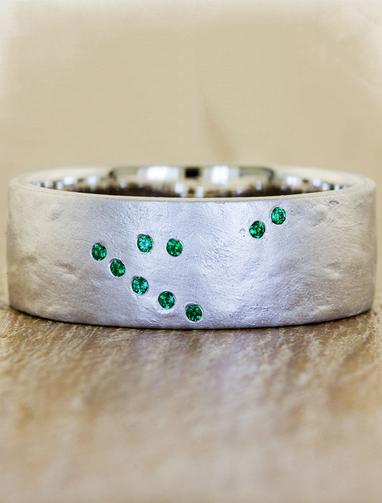 caption:Customized with emeralds in platinum