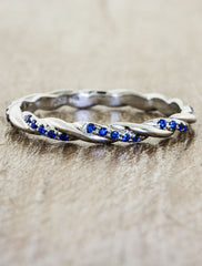 caption:Customized with blue sapphires