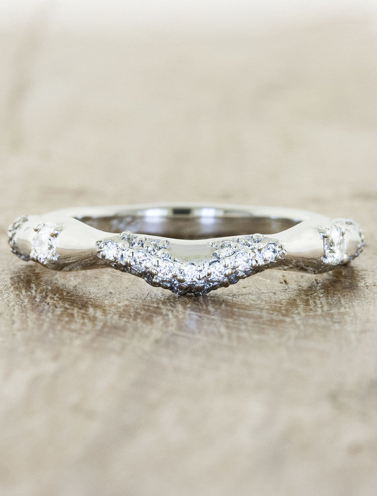 wavy, varying thickness diamond wedding band - white gold