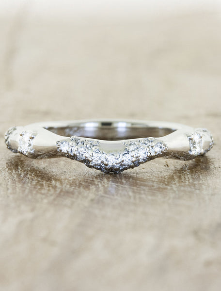 wavy, varying thickness diamond wedding band - white gold