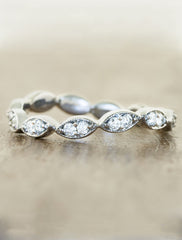 vintage-inspired curved wedding ring with diamonds