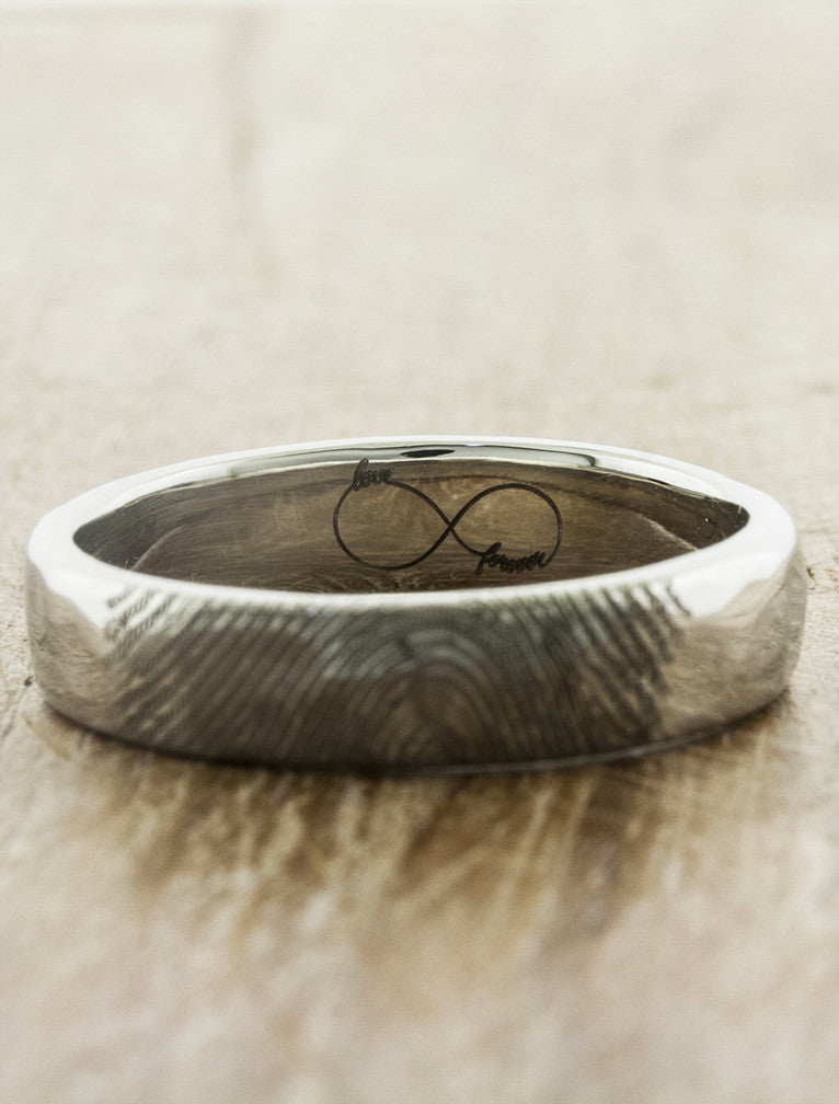 caption:Shown with a custom engraving inside in polished 14k white gold