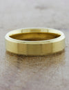 caption:Shown in 6mm with brushed center & polished edges in 18k yellow gold