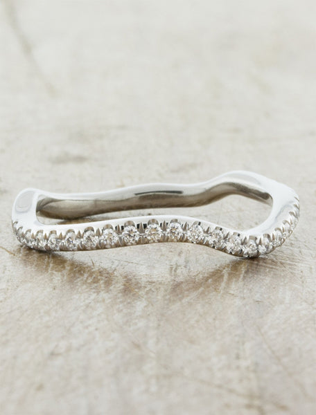 curved, wavy diamond studded wedding rings