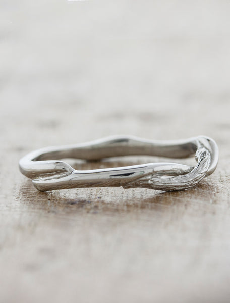 organic shape twisted wedding band with bark and smooth texture
