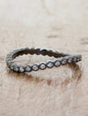 caption:Customized in black rhodium