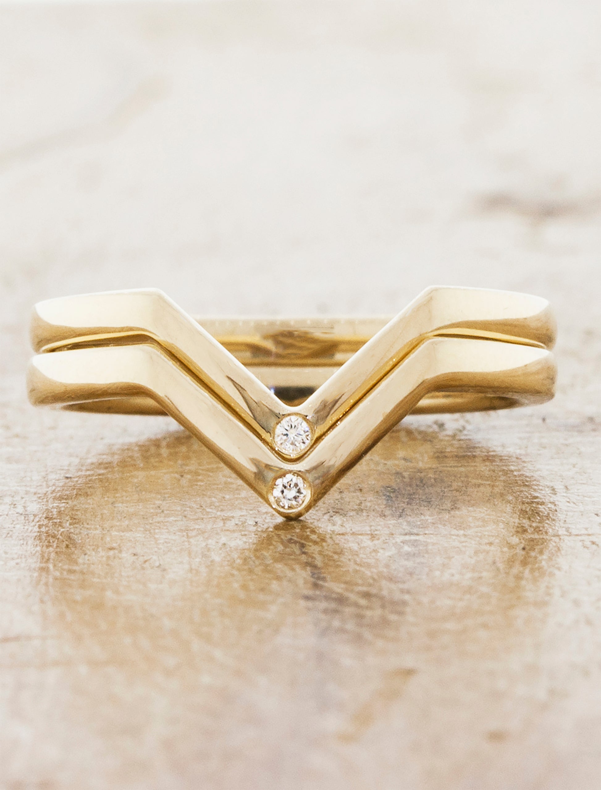 Puzzle piece fit wedding band;caption:Marie Wedding Bands Pictured in 14k Yellow Gold with Diamonds 