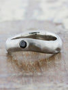 caption:Customized with black diamond in platinum