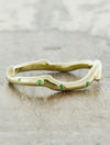 caption:Customizes with emerald stones in 14k yellow gold