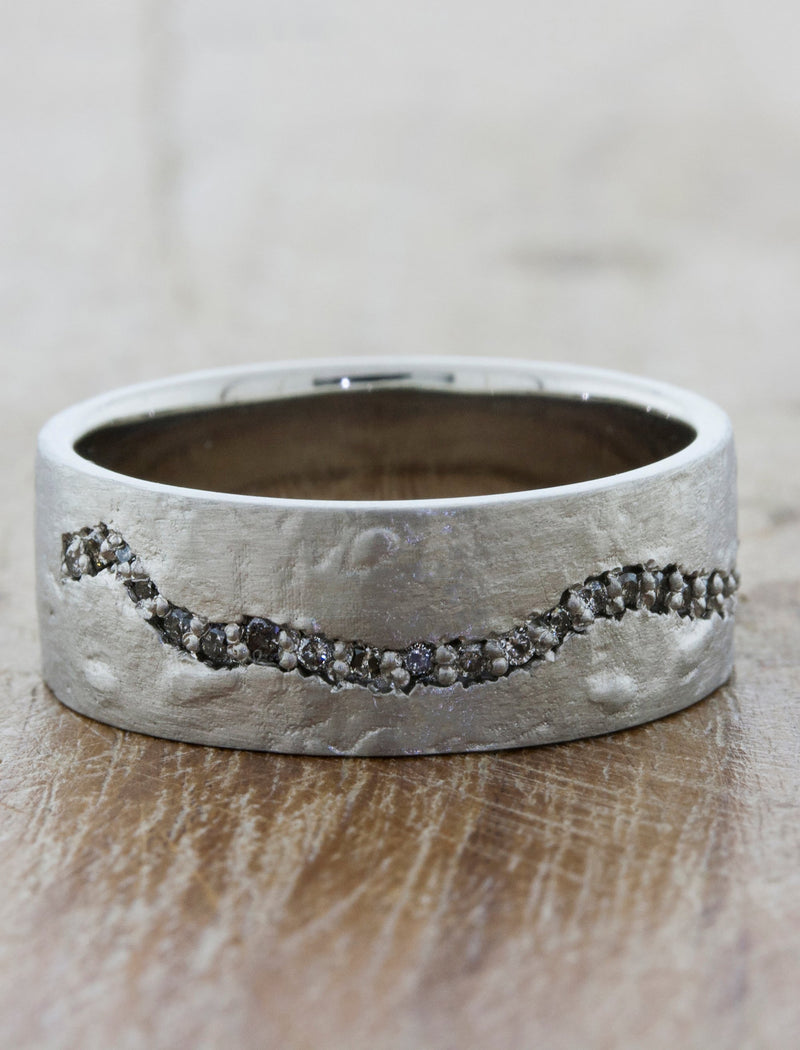 caption:Shown in platinum without plating, and customized with grey diamonds