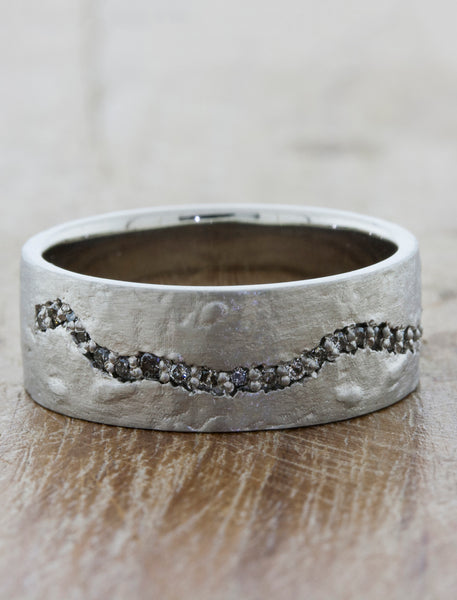 caption:Shown in platinum without plating, and customized with grey diamonds