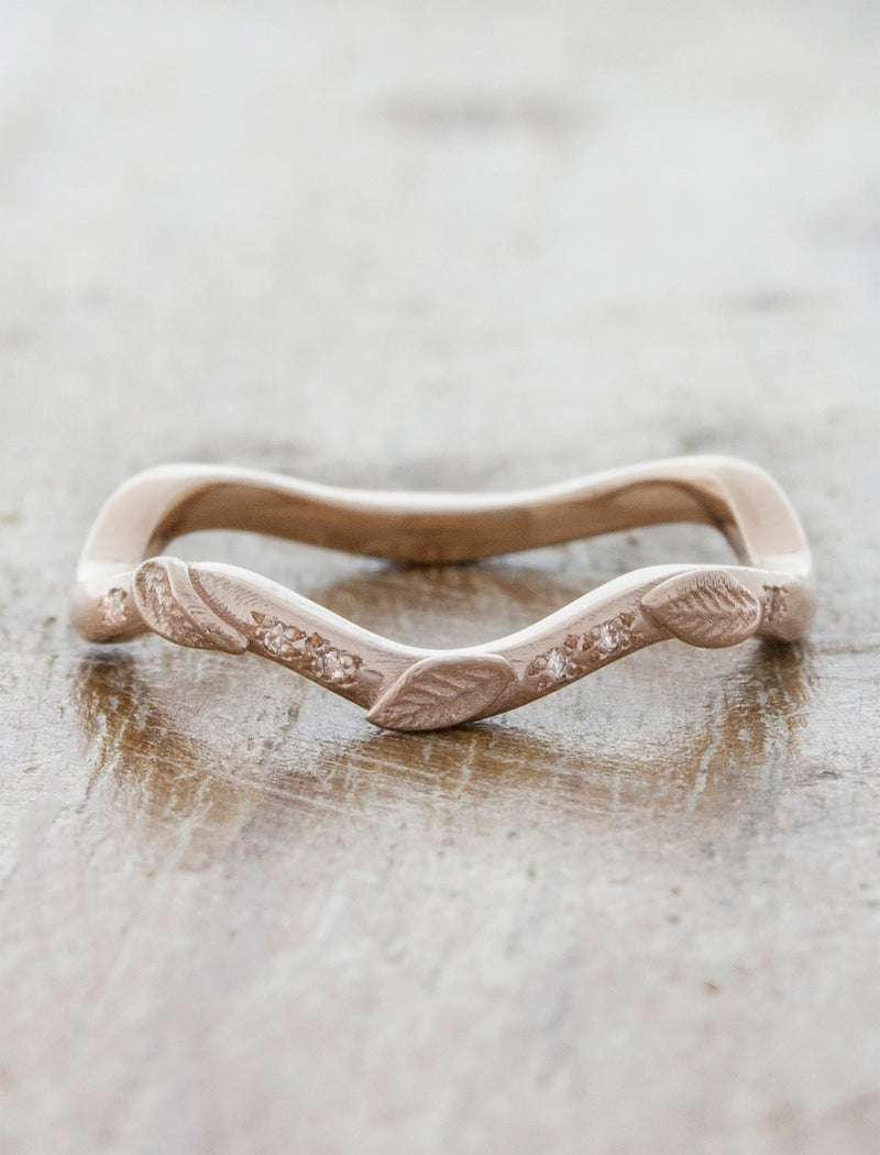 caption:Customized with diamond accents in 14k rose gold
